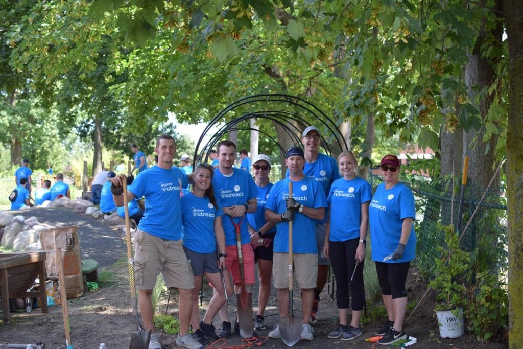 Insero employees work during Volunteer Day at Rochester Childfirst Network