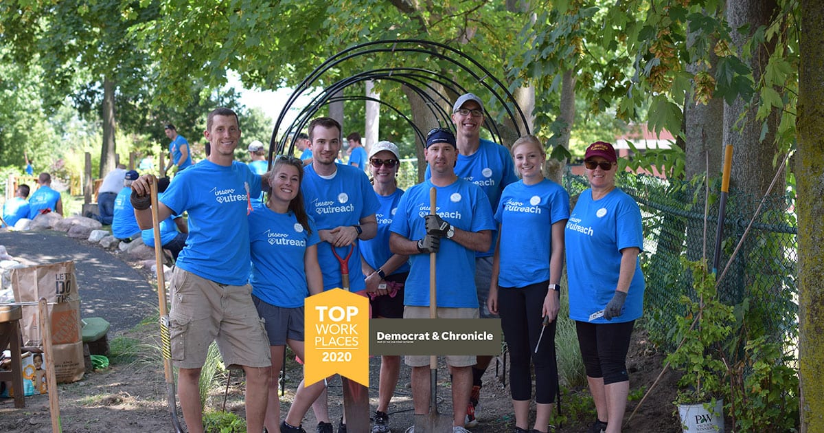 Rochester Top Workplaces 2020 logo over a team photo from Insero's first Volunteer Day