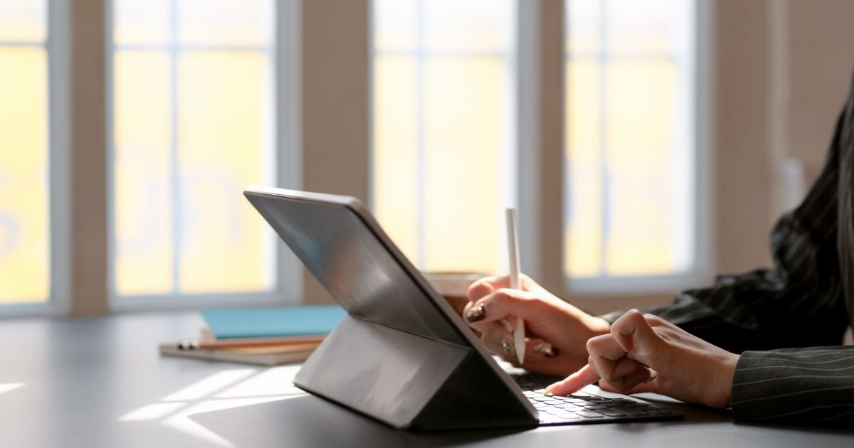 woman using a tablet to view accounts payable