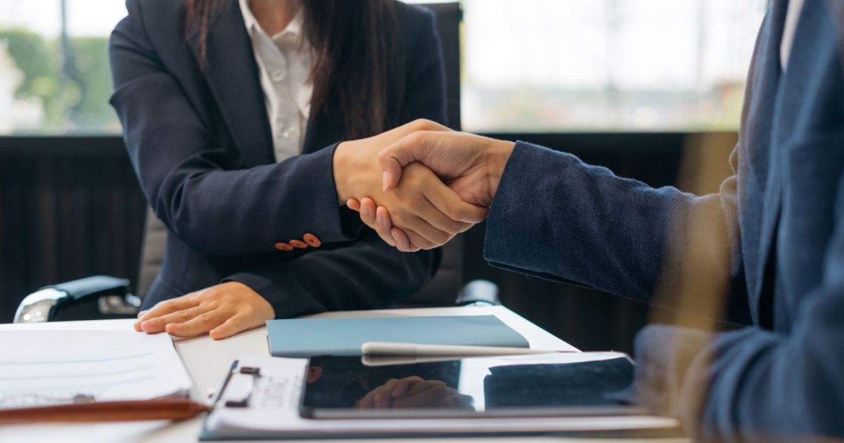 partner lawyers shaking hands