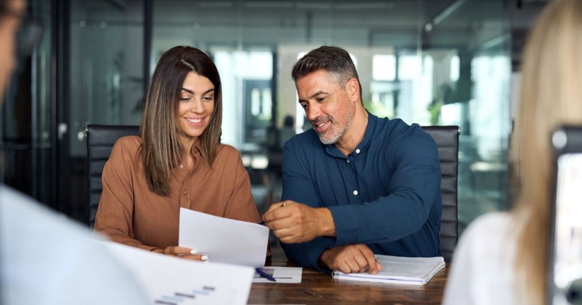 Executives working with documents